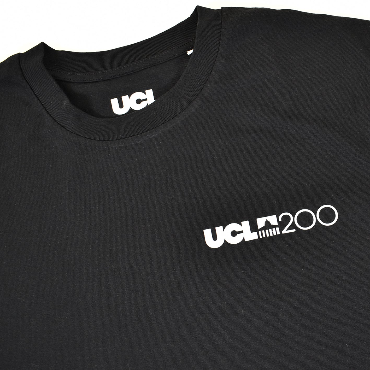 Black t-shirt with 'UCL200' logo on chest