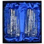 Two engraved glass tumblers in a box with blue satin lining