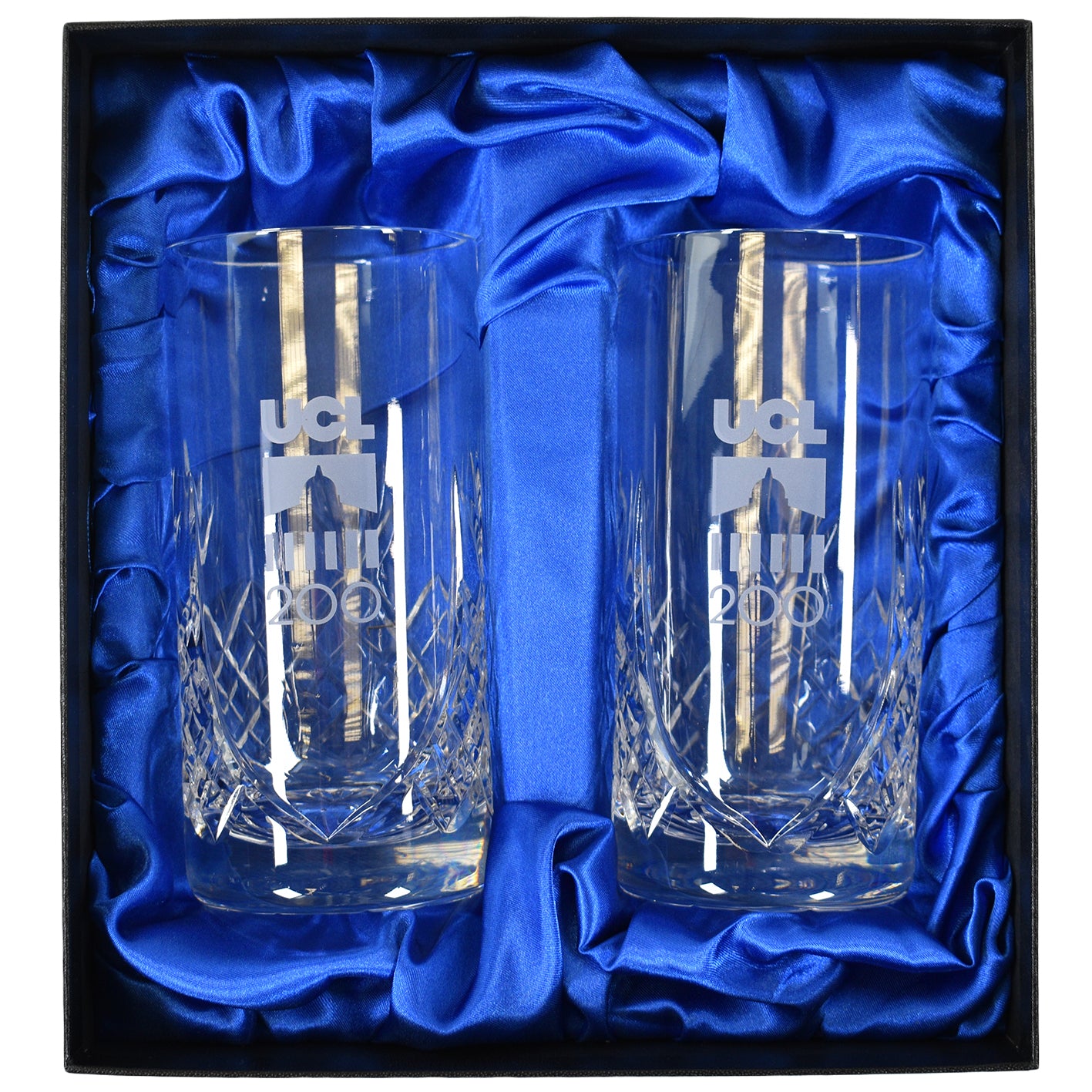 Two engraved glass tumblers in a box with blue satin lining