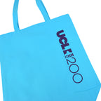 Blue tote bag with 'UCL 200' logo on the right hand size